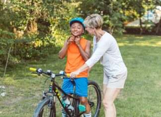 Teaching kid how to ride a bike