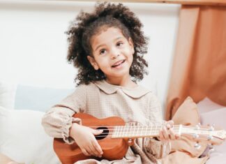 Girl playing ukelele