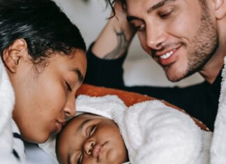 Parents put baby to sleep