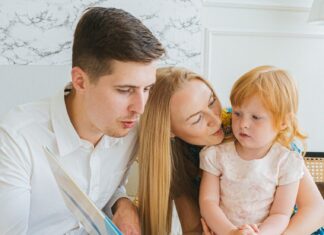 Parents reading to baby