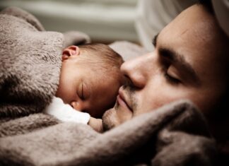 Dad and baby sleeping