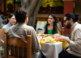 Friends eating dinner