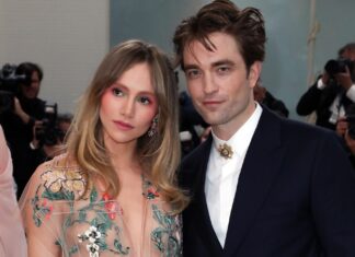 Suki Waterhouse and Robert Pattinson at The Metropolitan Museum of Art's Costume Institute Benefit, celebrating the opening of the Karl Lagerfeld: A Line of Beauty exhibition in May 2023