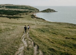 Family Hiking in Worbarrow Bay, Isle of Purbeck, Dorset, England, United Kingdom