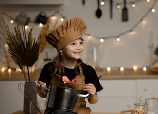 Child wearing a chef hat