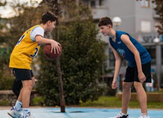 Teenagers Playing Basketball