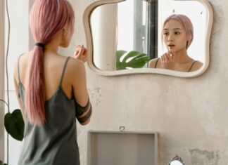 A Girl Looking at the Mirror