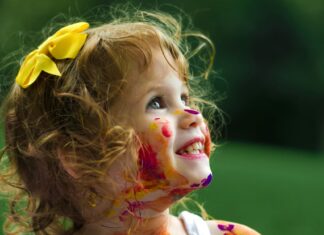 Girl covered in paint